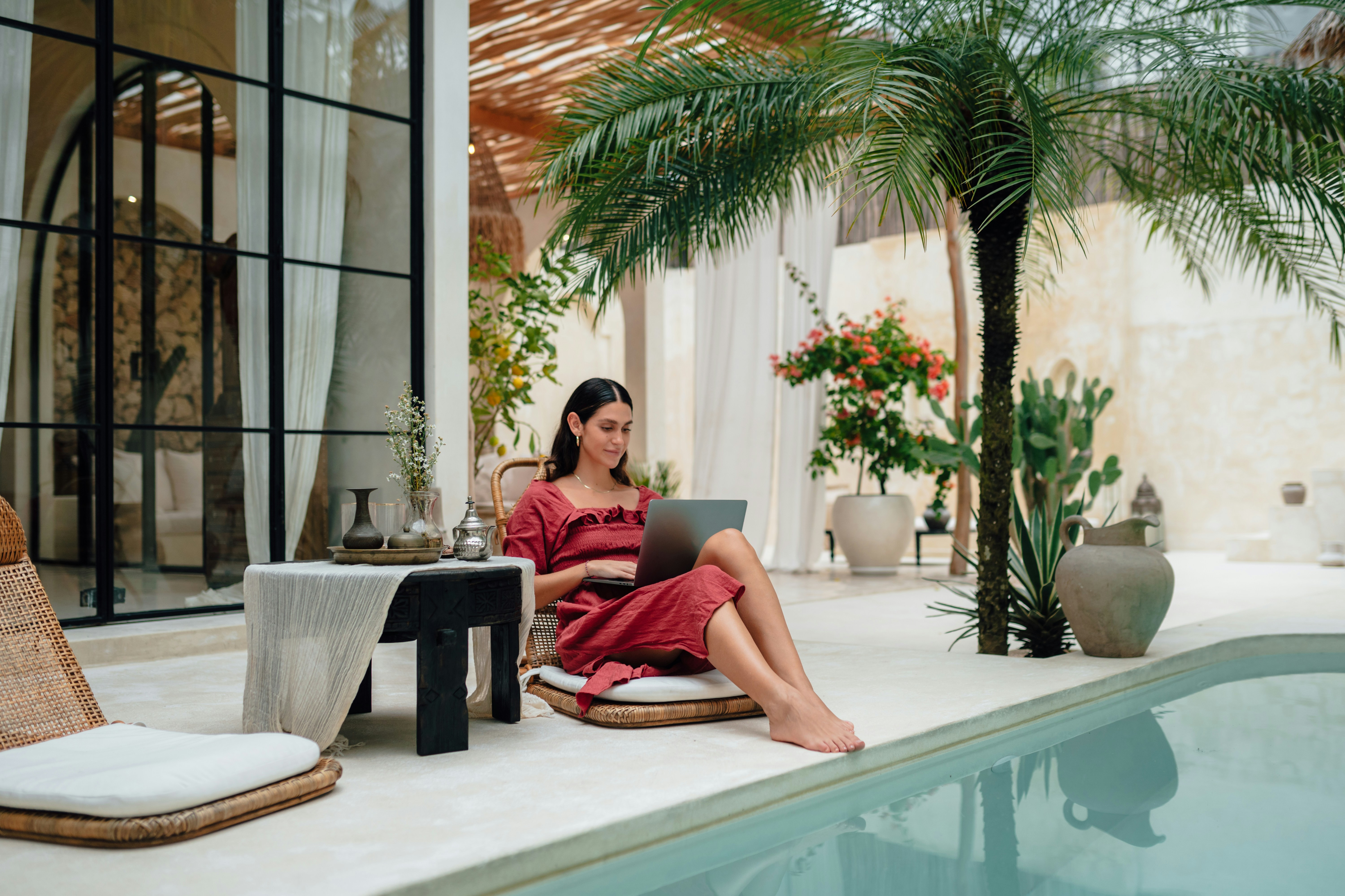 Doctor attending a conference next to the pool.